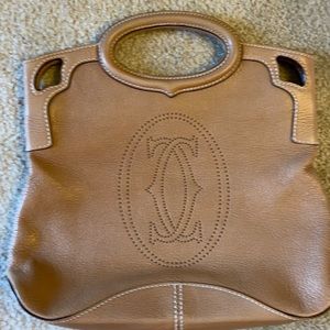 Cartier purse# unique and 1 of a kind. Used and in good condition.